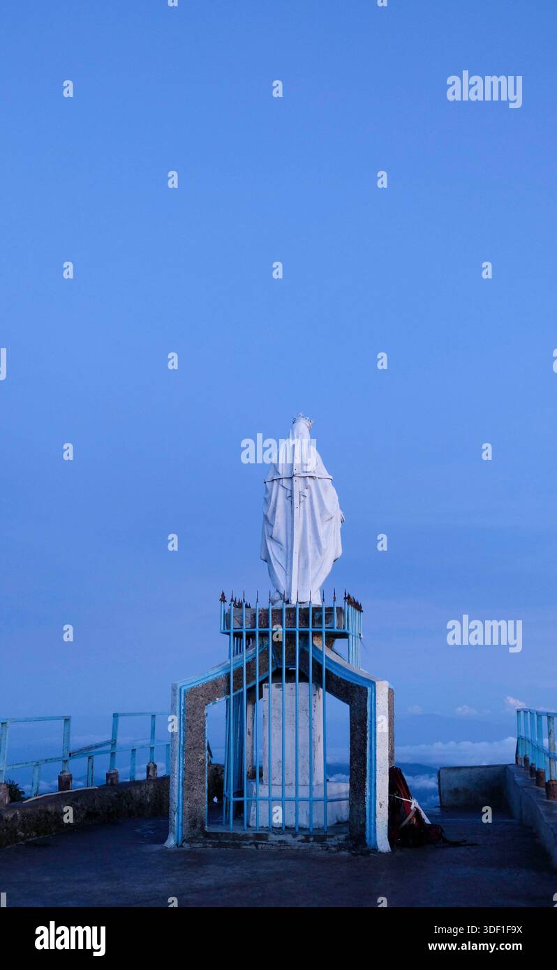 Back view of the Virgin Mary statue on the peak of Mount Ramelau, Timor ...