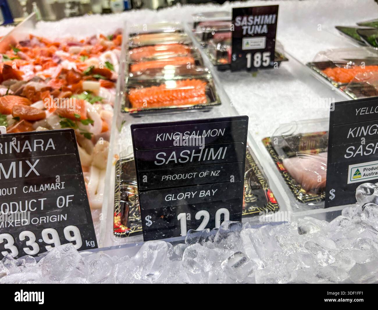 Australia, fishmongers store, fresh fish seafood for sale King Salmon sashimi and sashimi tuna from Glory Bay New Zealand - Smartphone Captured Stock Image