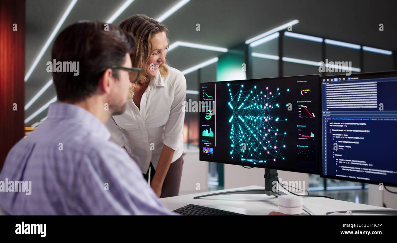 Engineers Training AI Models For Future Business Surveillance System Development Stock Photo
