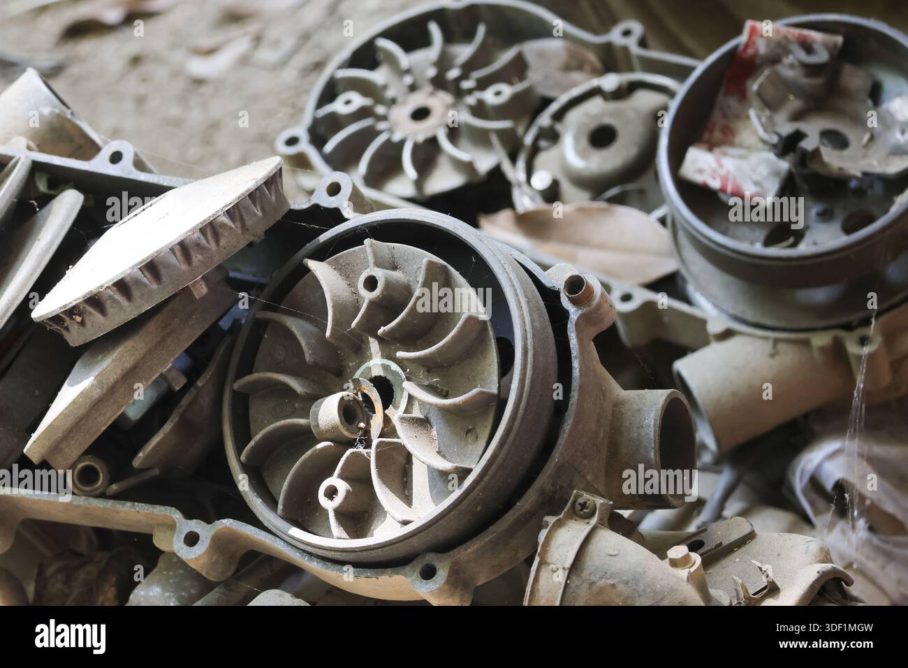 Pile of rusty metal engine parts and disassembled mechanical components ...