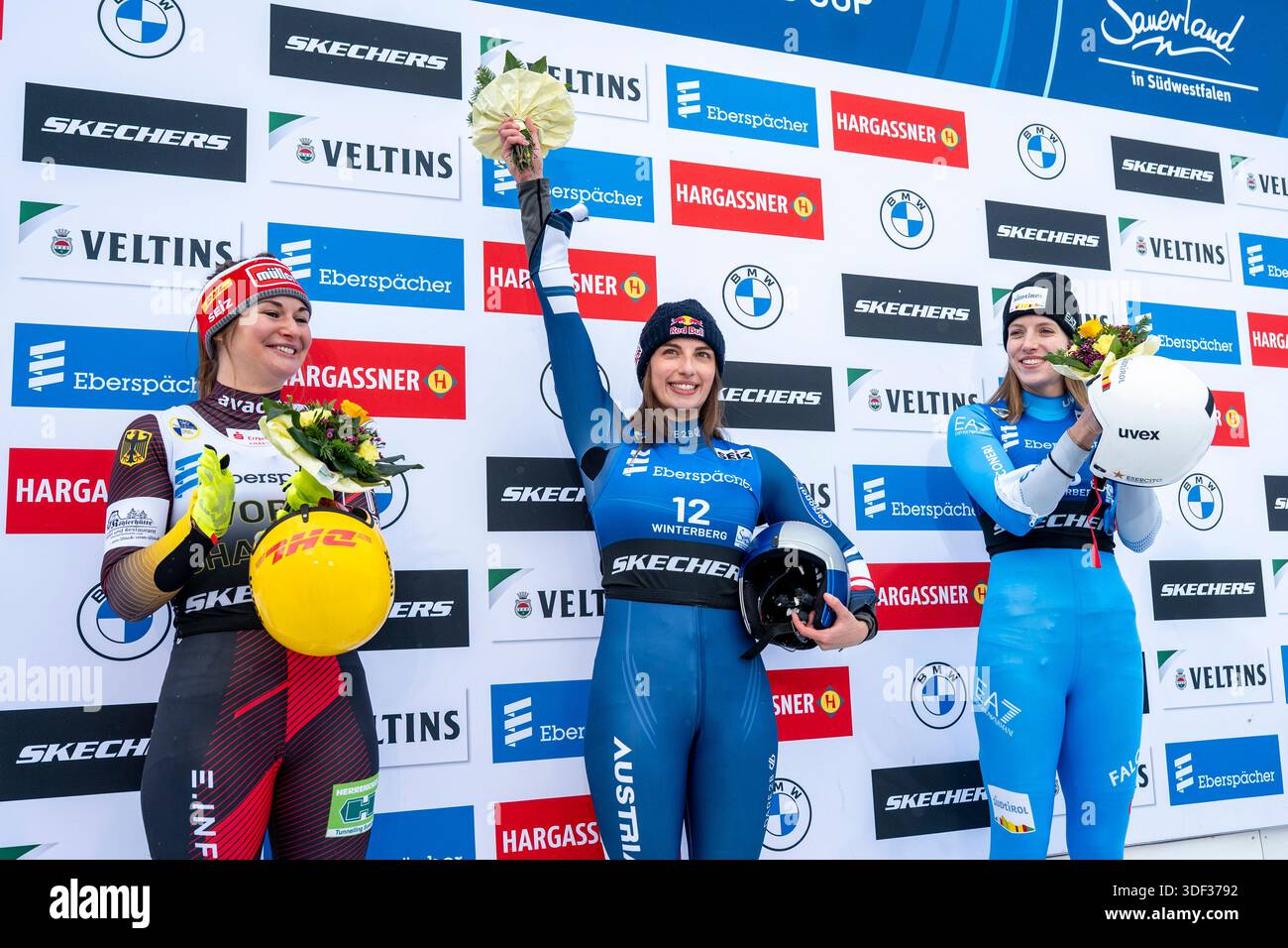 Winterberg, Germany. 10th Jan, 2025. Luge: World Cup, single-seater, women, 2nd run: runner-up Julia Taubitz (l-r, Germany), winner Hannah Prock (Austria) and third-placed Verena Hofer (Italy) stand together during the winners' conference. Credit: David Inderlied/dpa/Alamy Live News Stock Photo