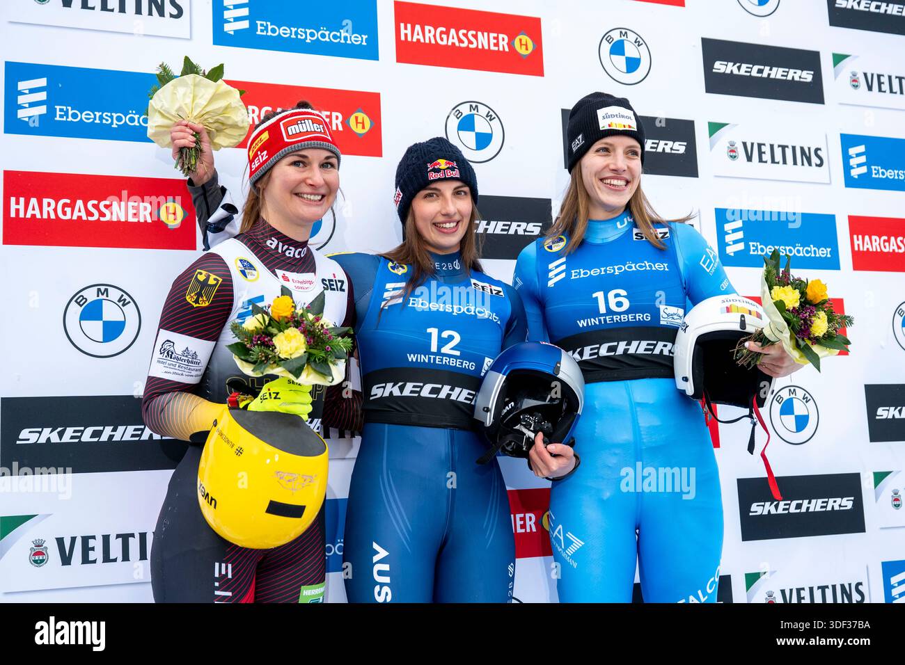Winterberg, Germany. 10th Jan, 2025. Luge: World Cup, single-seater, women, 2nd run: runner-up Julia Taubitz (l-r, Germany), winner Hannah Prock (Austria) and third-placed Verena Hofer (Italy) stand together during the winners' conference. Credit: David Inderlied/dpa/Alamy Live News Stock Photo