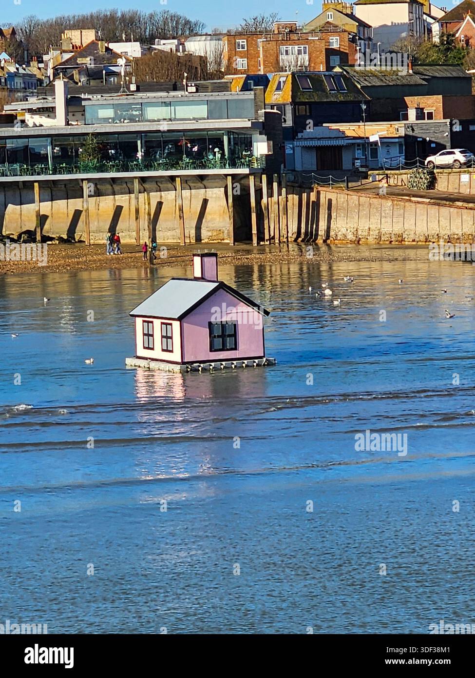 The Pink House in Folkestone Harbour. The art installation was part of Folkestone's triennial, one of a number of tiny houses called "Holiday Home" - Smartphone Captured Stock Image