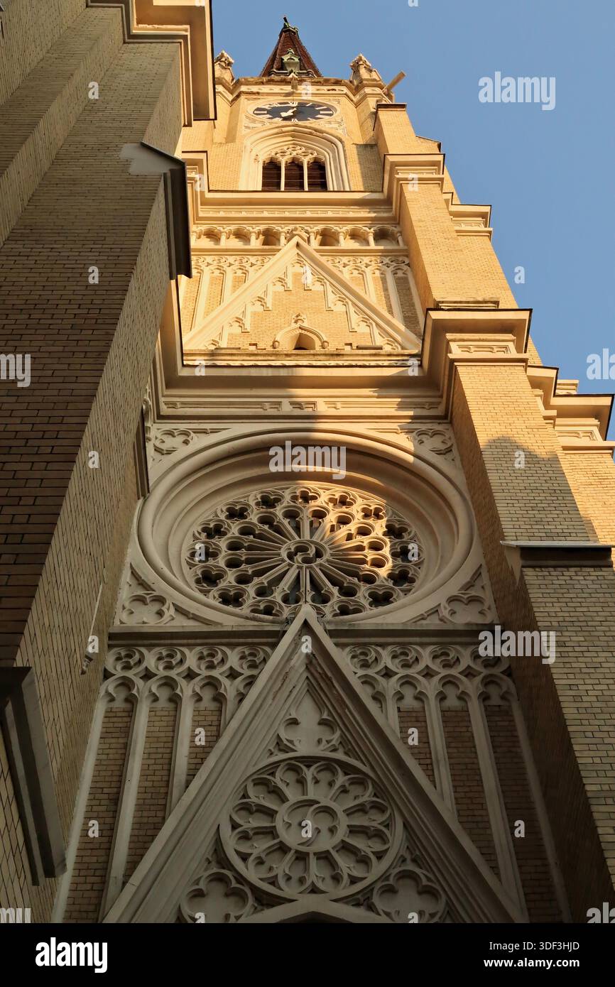 Closer look onto the elaborate facade of the bell, clock tower of the ...