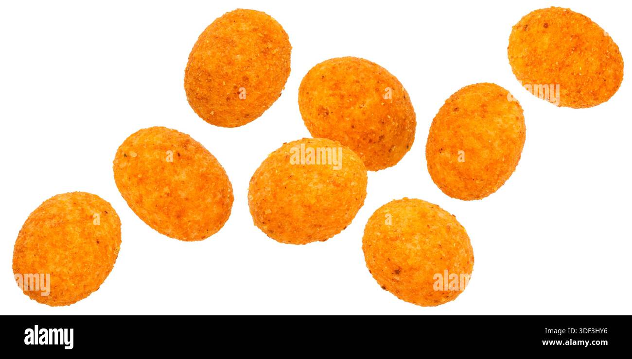 Falling paprika coated peanuts isolated on white background with clipping path Stock Photo