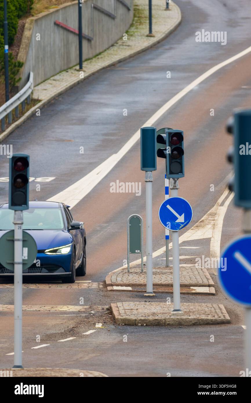 traffic signals and directional road signs on an urban street Stock ...