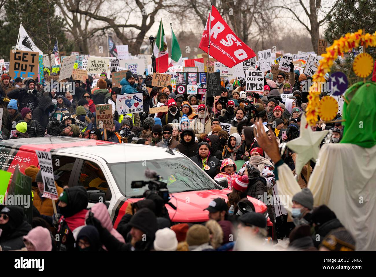 EDS NOTE: OBSCENITY - Protesters gather during a rally for Renee Good ...