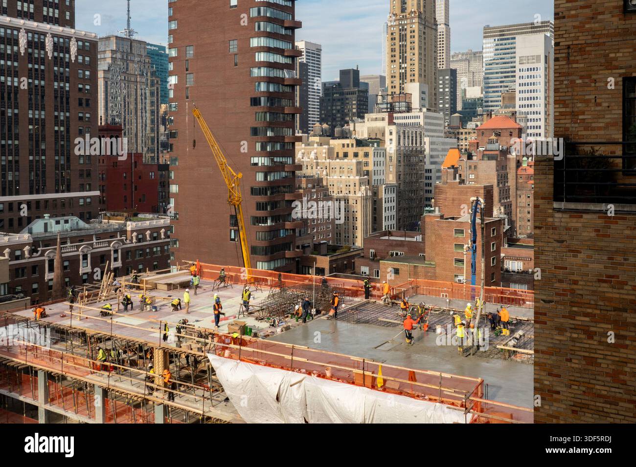 A residential high-rise building is under construction at East 35th ...