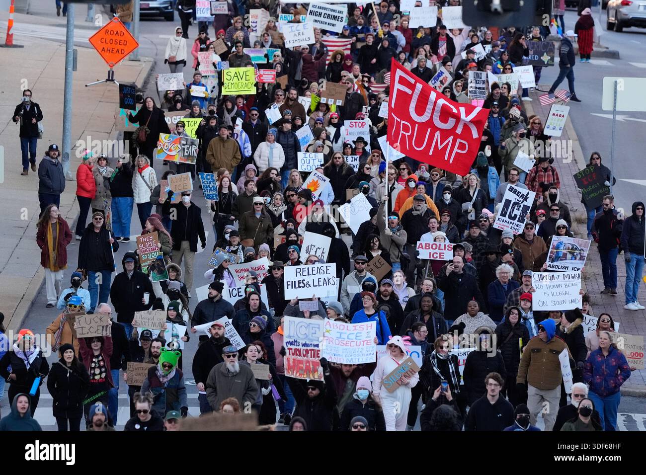 EDS NOTE: OBSCENITY - Protesters march during a rally for Renee Good ...
