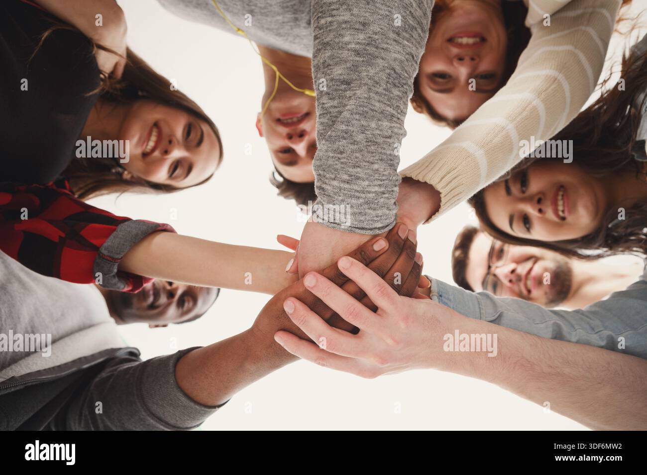 Teamwork and teambuilding, people connect hands Stock Photo - Alamy
