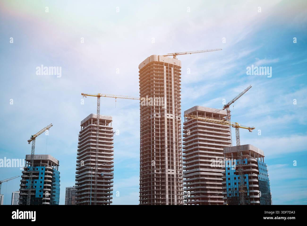 Tall modern building being built from concrete Stock Photo