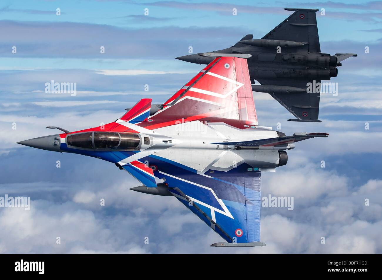 Two French Air Force Dassault Rafale aircraft are shown airborne in ...