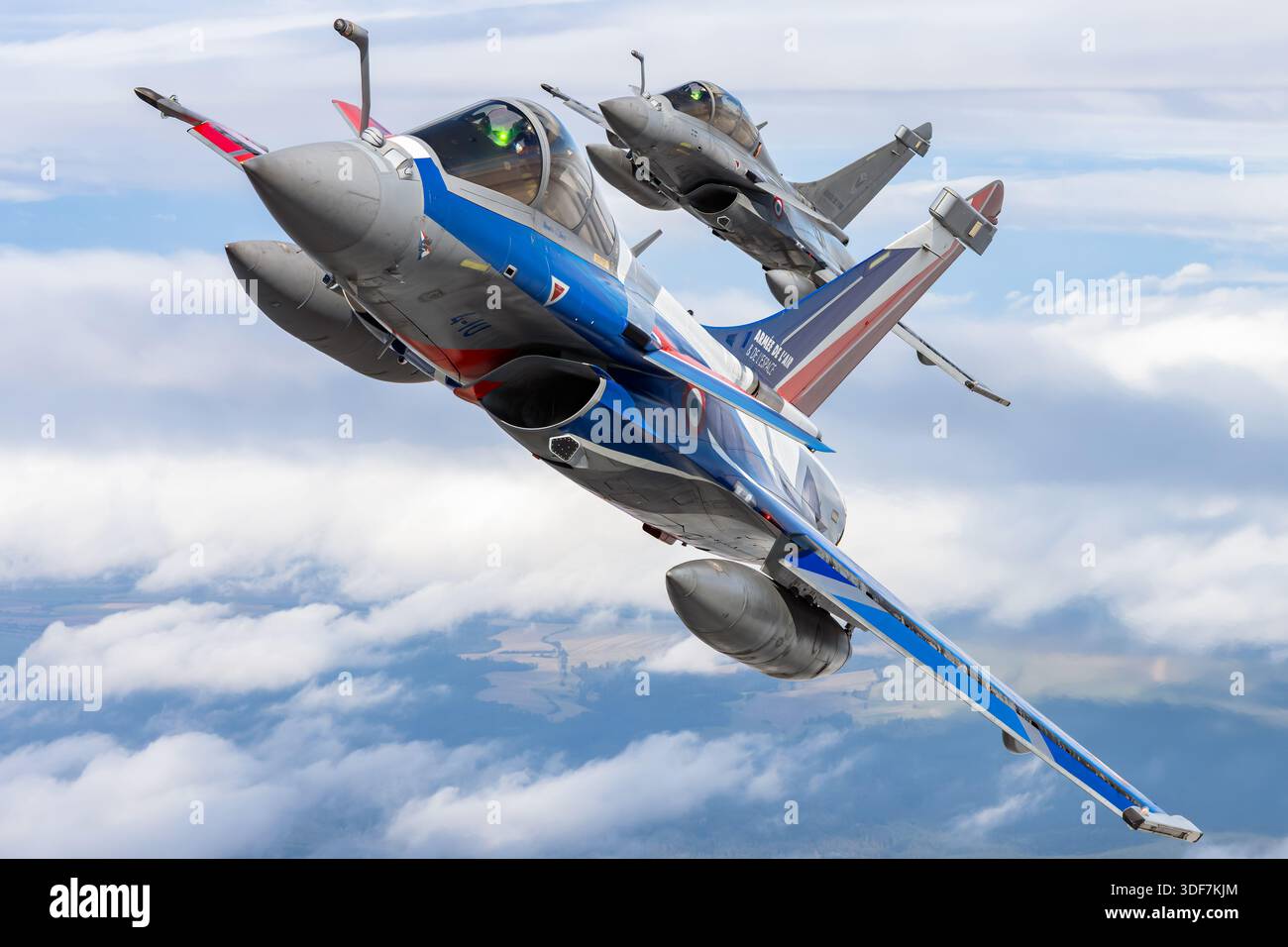 Two Dassault Rafale jets of the French Air Force are shown flying side ...