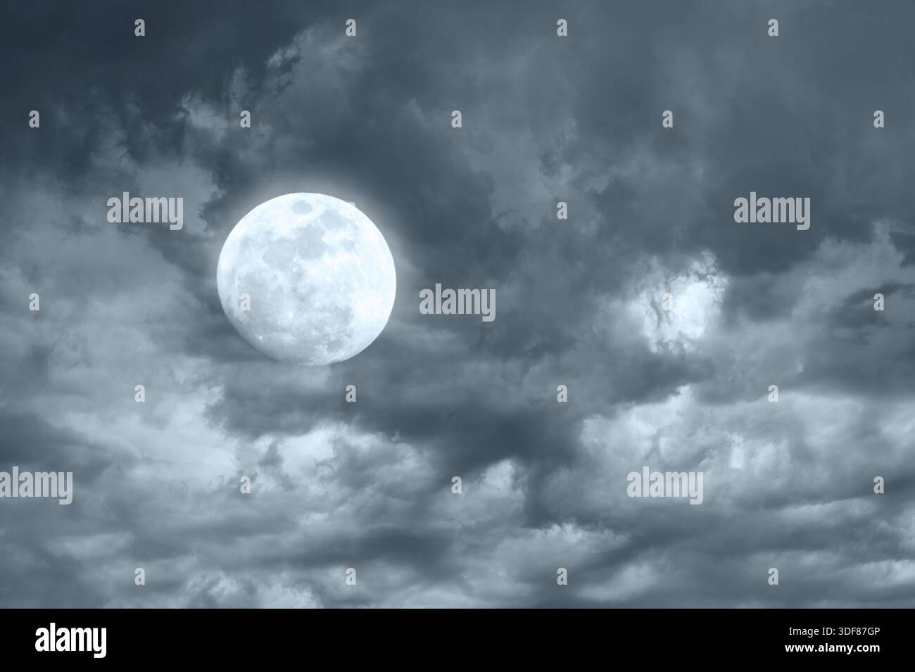 Amazing night sky with shining full moon and dramatic clouds Stock ...