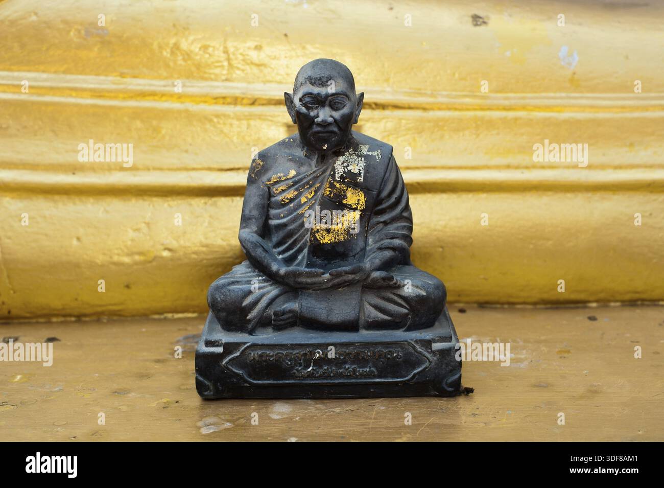Black monk statue in Wat Phra Yai Temple. Koh Samui island, Thailand Stock Photo