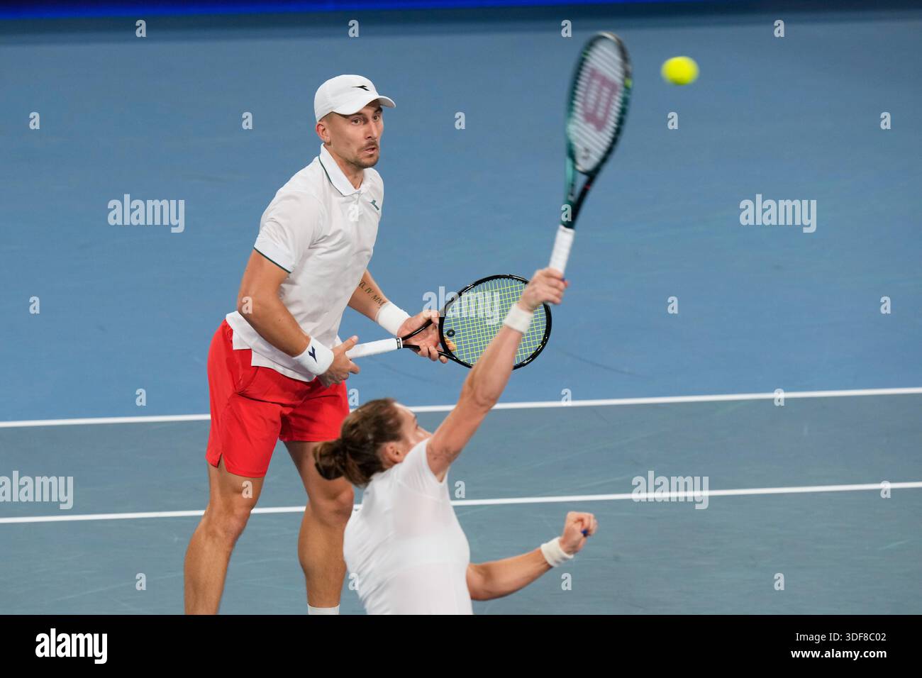 Katarzyna Kawa, right, and Jan Zielinski of Poland compete against ...