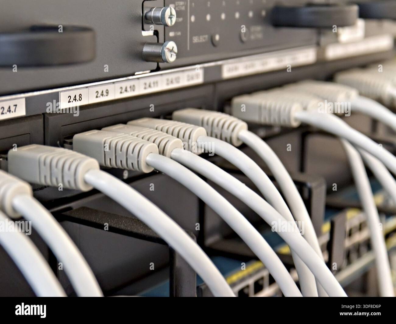 Patch Panel server rack with gray cords Stock Photo
