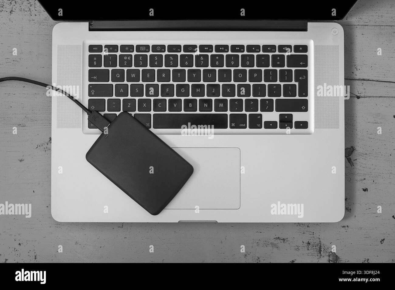 External Hard Disk Over Laptop Keyboard, 5 Stock Photo