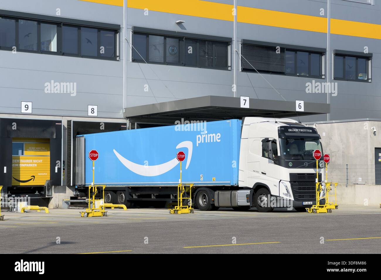 Amazon Prime truck is waiting to be unloaded at the loading dock of the ...