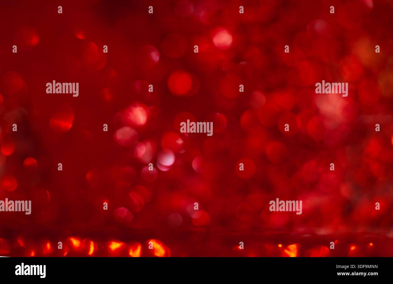 Vibrant Red Abstract Bokeh Background with Circles and Light Effects Stock Photo