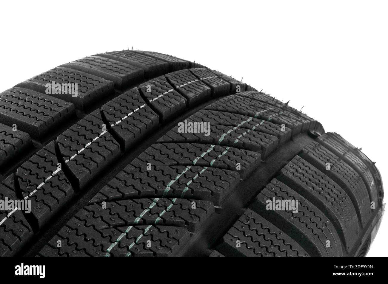Winter tire close up on white background Stock Photo