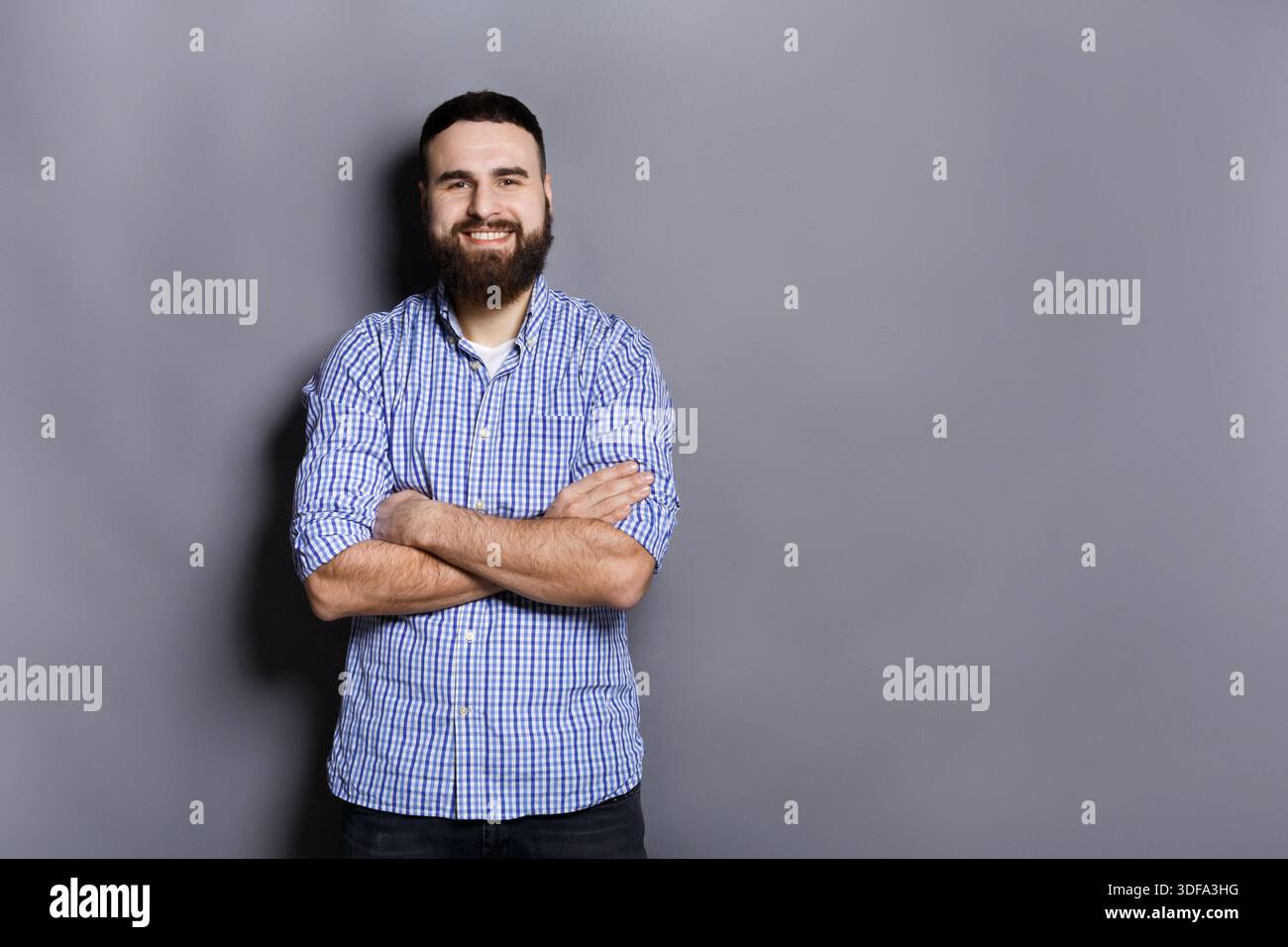 Handsome confident bearded man portrait Stock Photo