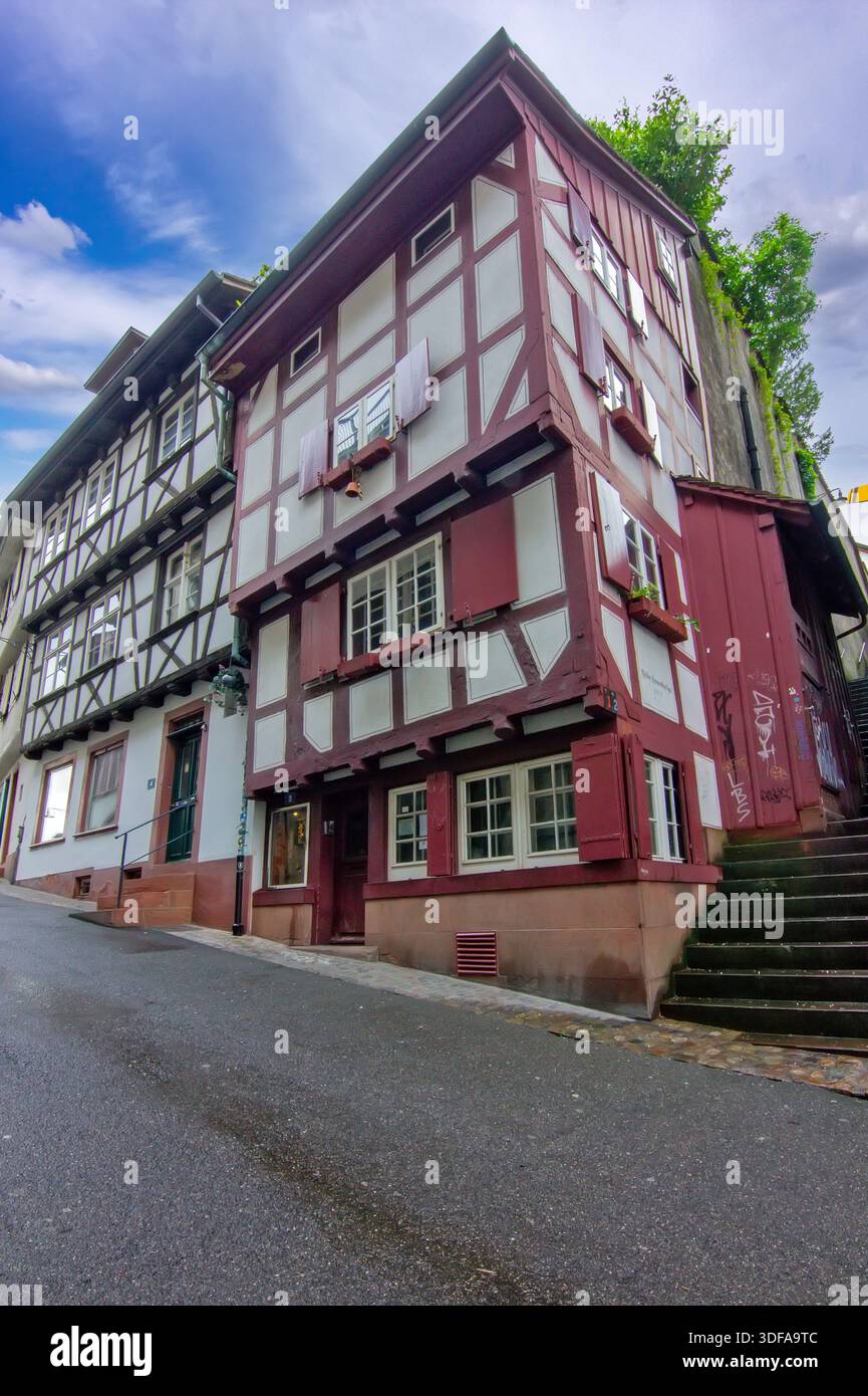 A historic half timbered house in Basel with wooden details, shutters ...