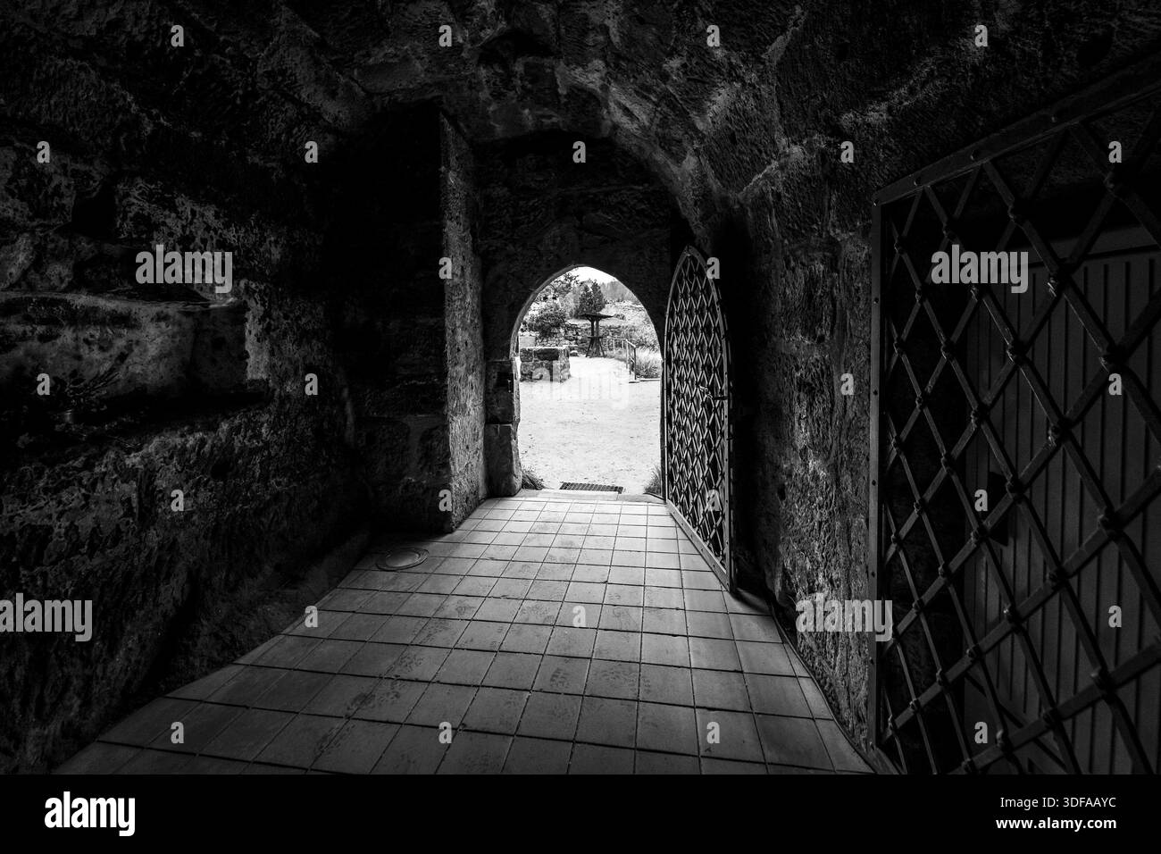Arched gateway gates entrance Black and White Stock Photos & Images - Alamy