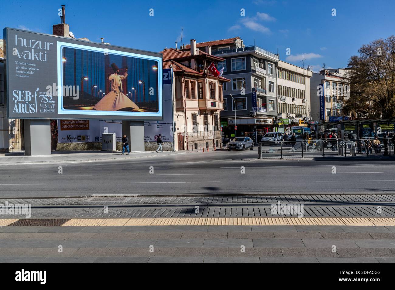 A large LED display in Konya advertises the Şeb-i Arus festival with a dancing dervish, Karatay, Turkey. Held annually on 17 December, the festival marks the death anniversary of Sufi mystic Rumi (1207–1273) and is regarded as a spiritual union with God. Stock Photo
