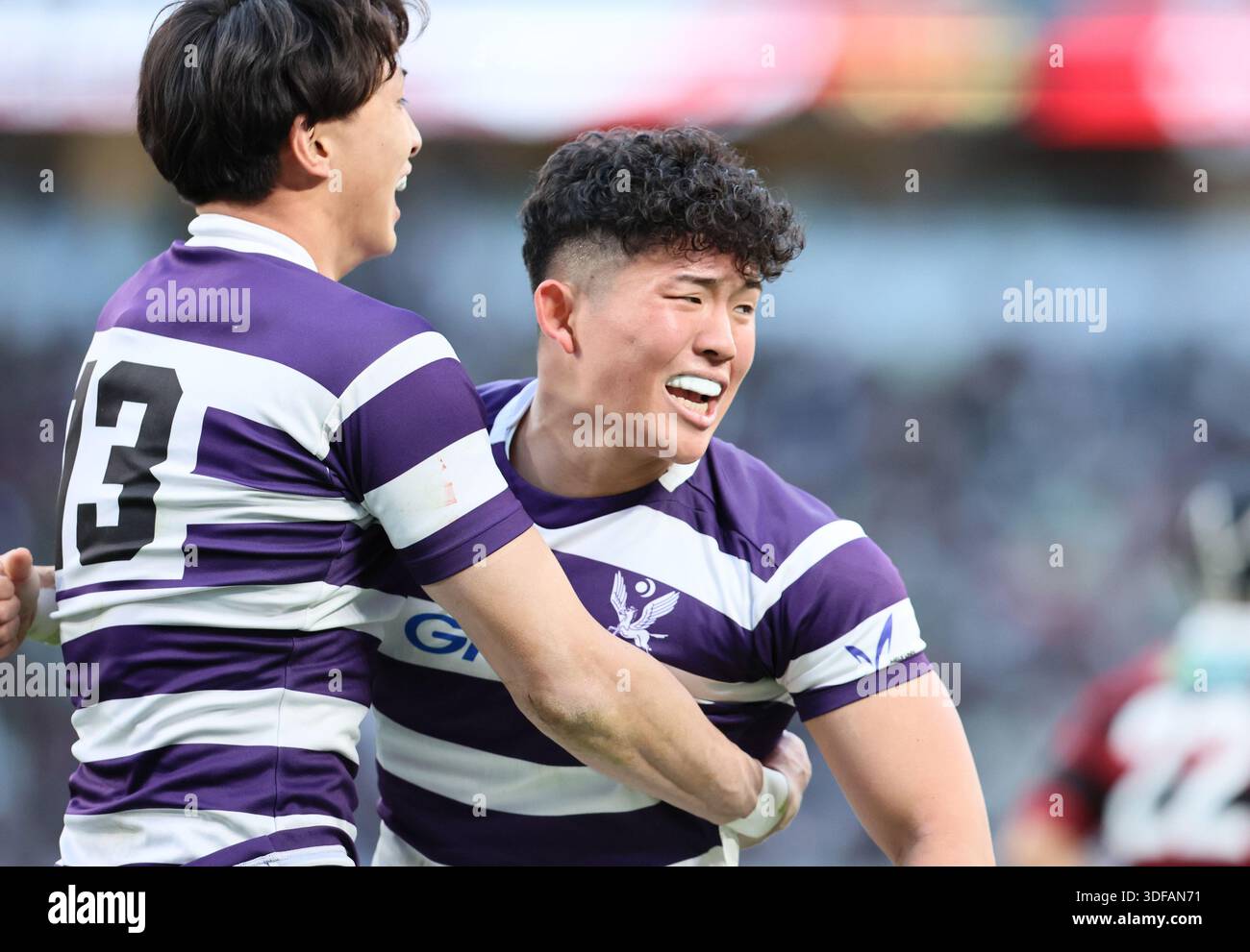 Tokyo, Japan. 11th Jan, 2026. Meiji University center Kaishun Azuma (L) hugs with his teammate Yoji Hagii (R) as they wins their victory of the 62nd Japan University Rugby Championship at Japan's national MUFG stadium in Tokyo on Sunday, January 11, 2025. Meiji defeated Waseda University 22-10 at the final of championship. (photo by Yoshio Tsunoda/AFLO) Stock Photo