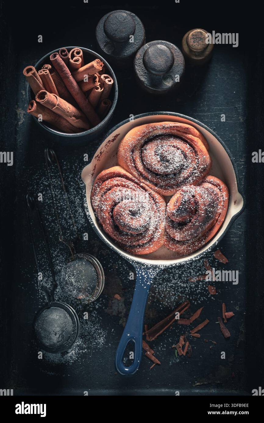 Tasty cinnamon buns as swedish dessert. Popular Swedish dessert. Swedish cuisine. Stock Photo