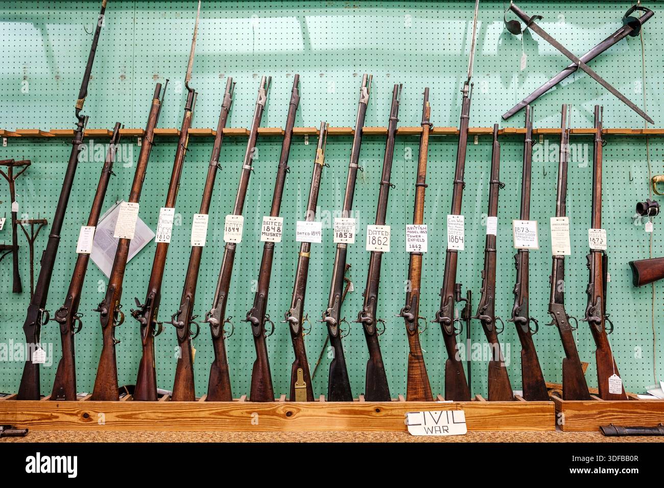 Collection of American Civil War era weapons, rifles, muskets, for sale at James H Cohen Antique Weapons & Rare Coinsantique store, New Orleans Stock Photo