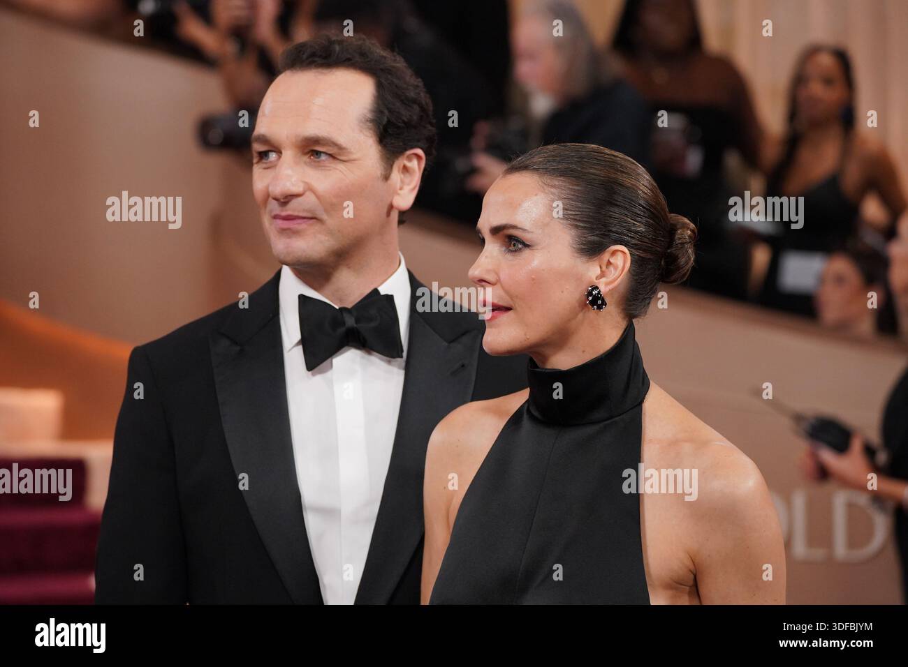 Matthew Rhys, left, and Keri Russell arrive at the 83rd Golden Globes