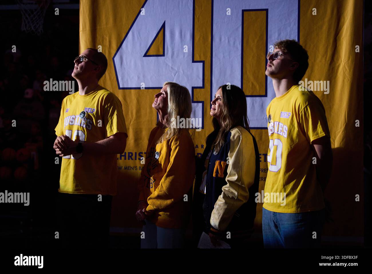 From left, the family of former Washington basketball player Christian ...