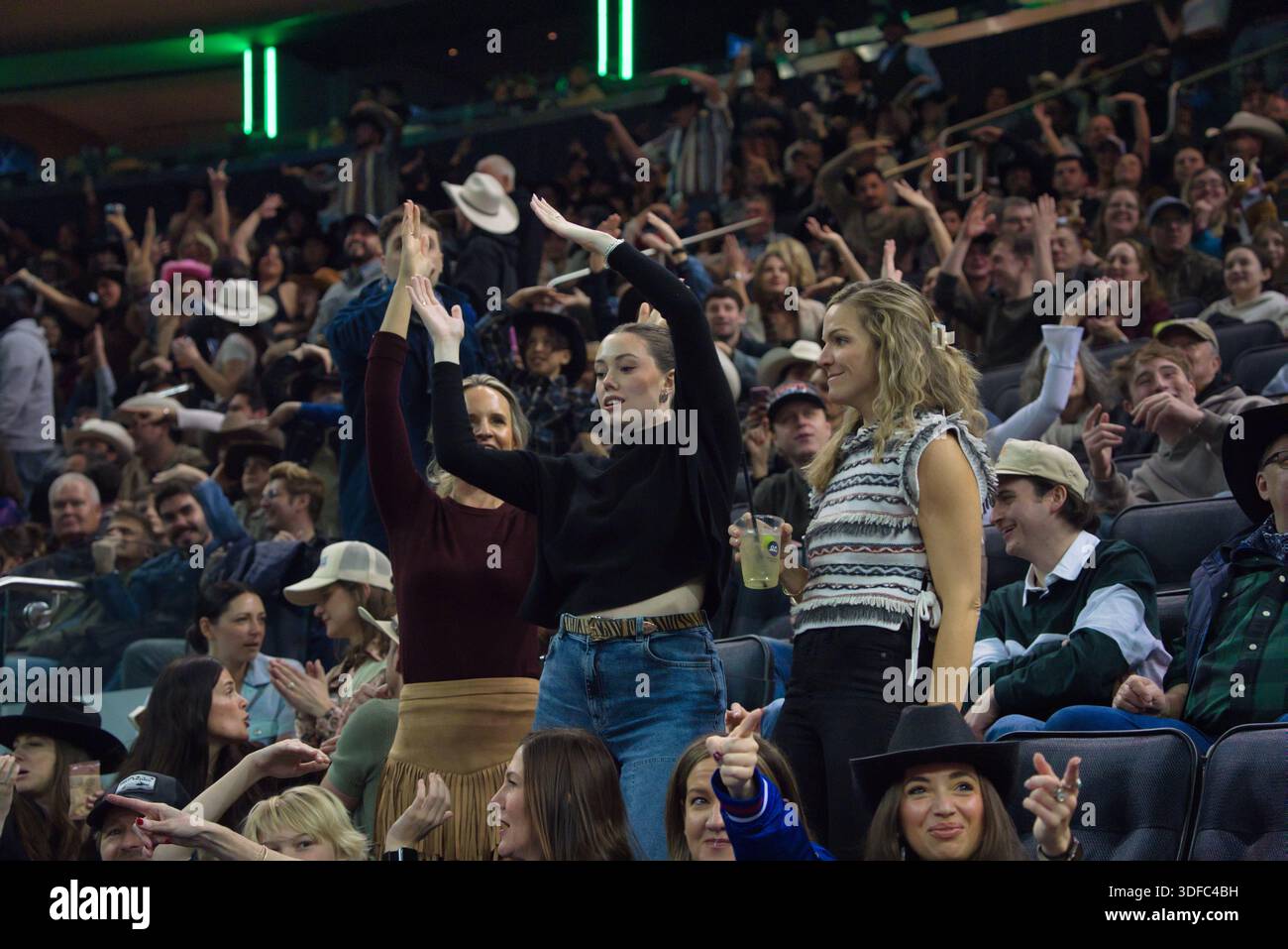Hands raised crowd women hi-res stock photography and images - Alamy