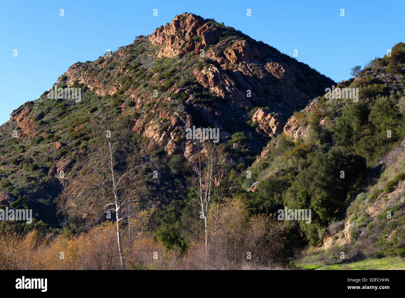 Rugged mountain slope rises above hi-res stock photography and images ...