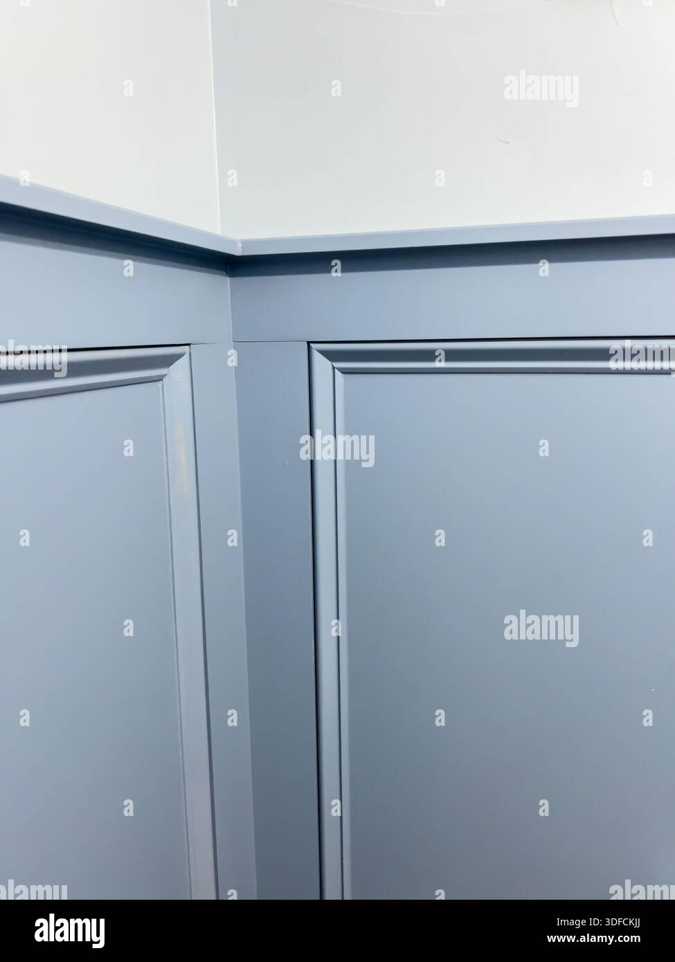 Blue Wainscoting and Trim Detail in Modern Bathroom Stock Photo - Alamy