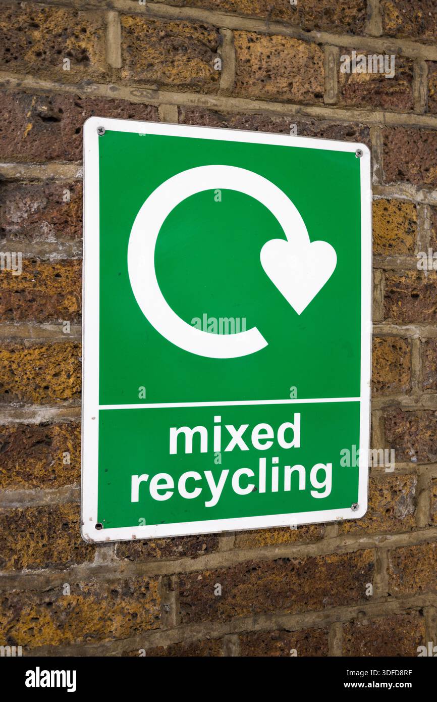 Mixed Recycling Sign Promoting Waste Sorting and Sustainability Stock Photo