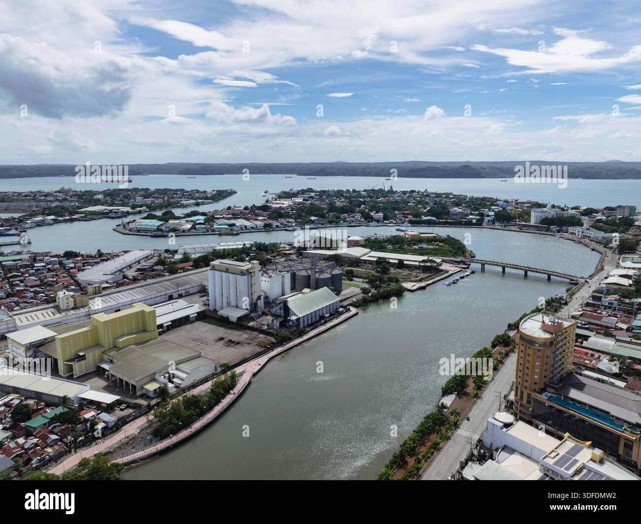 Aerial view of the Iloilo River gracefully curves through the urban ...