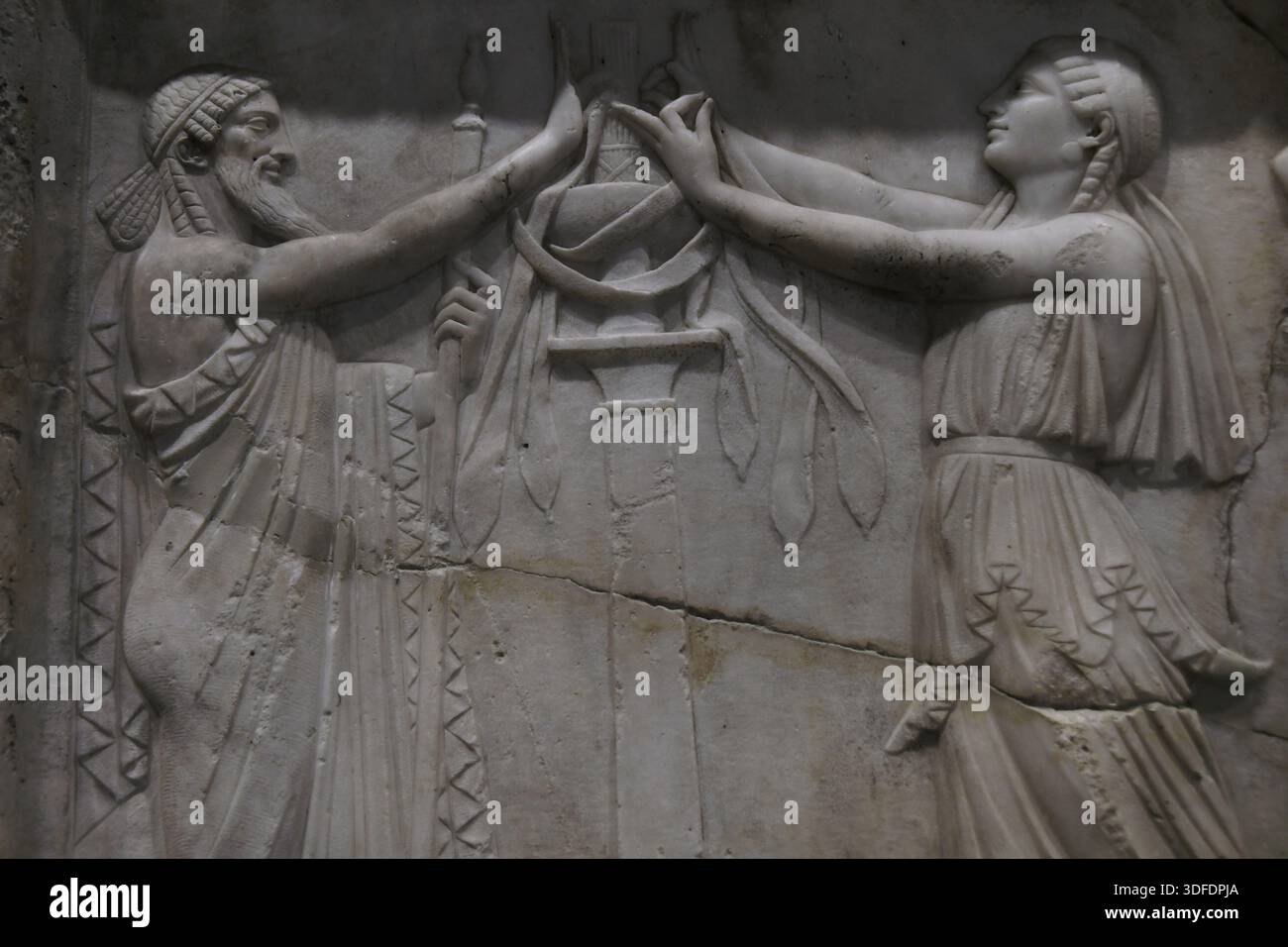 Ancient Greece. Priest and priestess in a ritual attitude. Detail of a ...