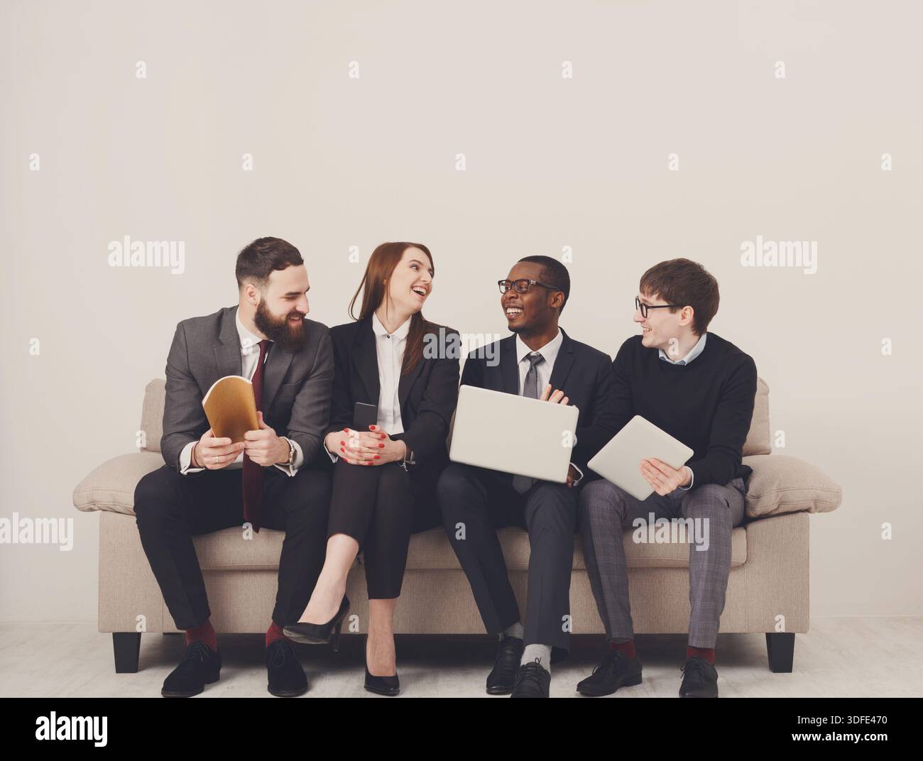 Happy team, business people laugh Stock Photo