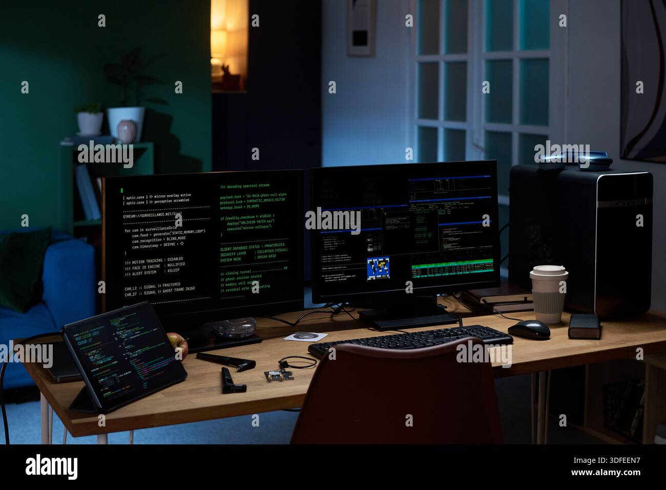 Young Man Working on Cybersecurity Programming at Night Stock Photo