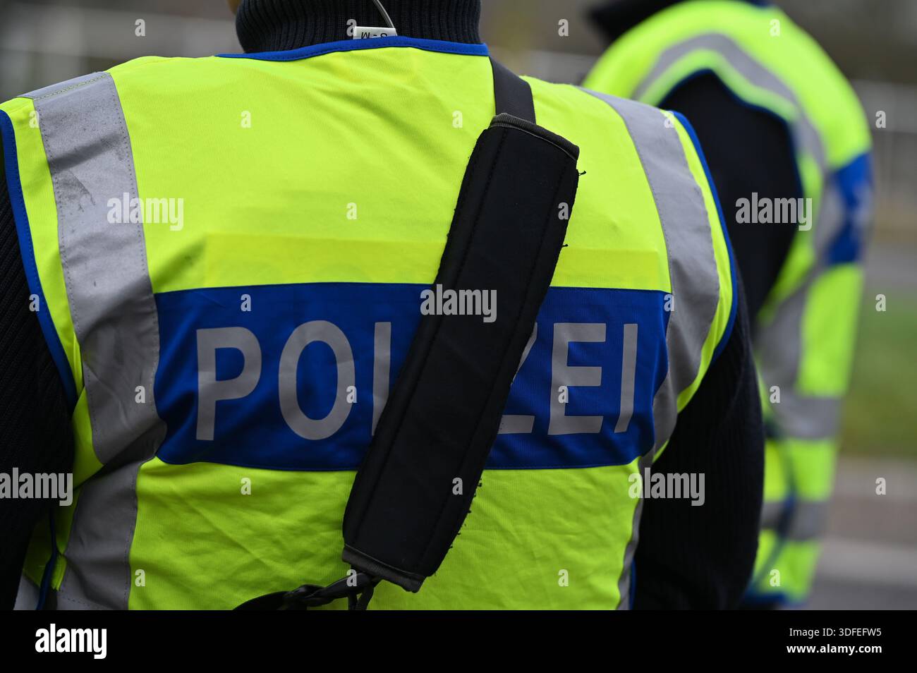PRODUCTION - 17 December 2025, Baden-Württemberg, Kehl: Two officers of ...