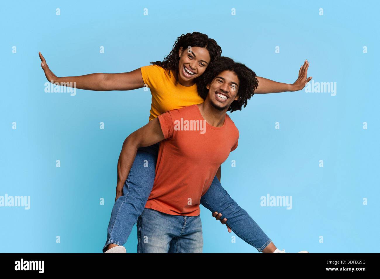 Pretty african american woman riding her lover back Stock Photo