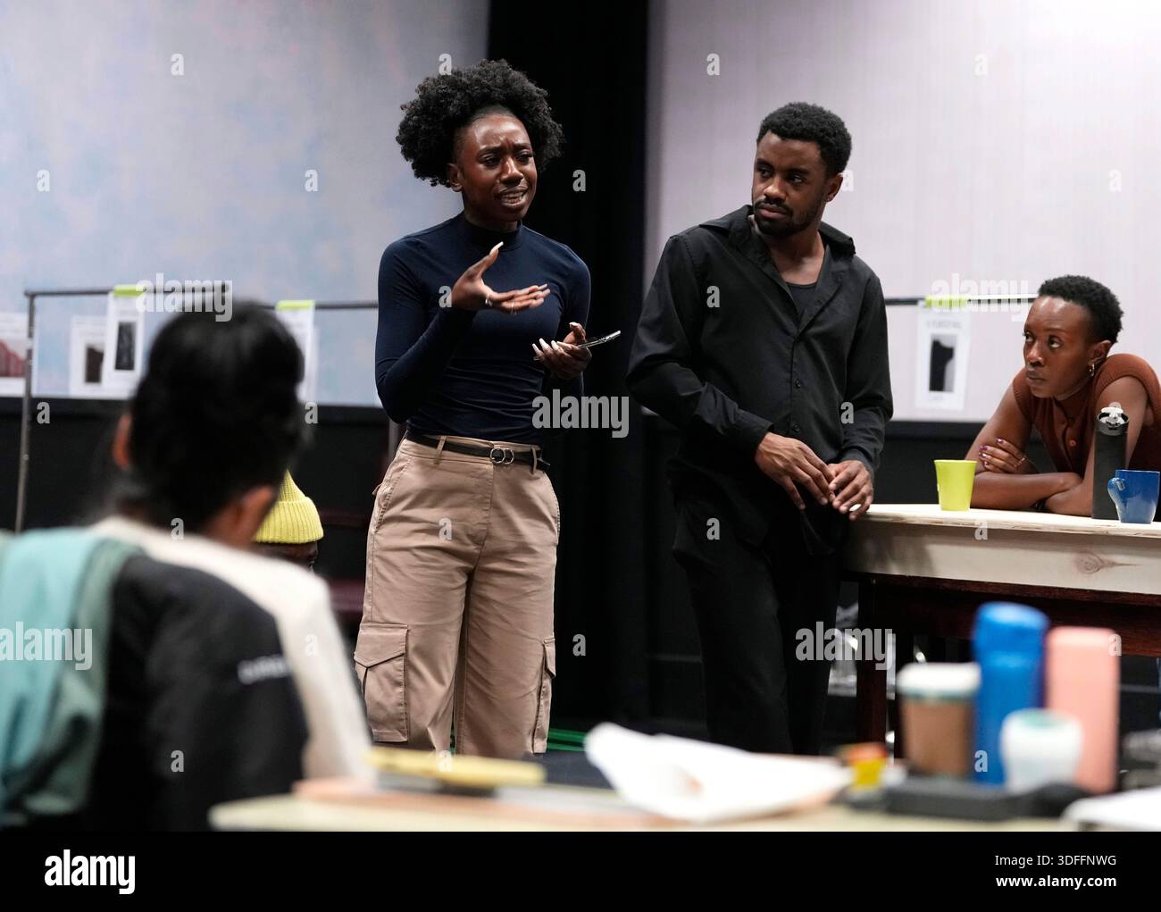 Makambe K. Simamba, speaks with director Nina Lee Acquino, left, during ...