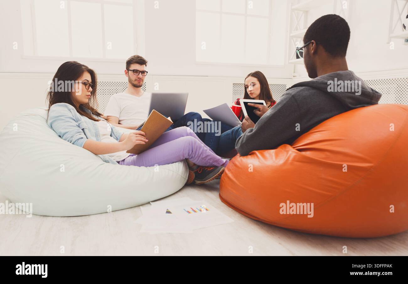 Students share opinions during break Stock Photo