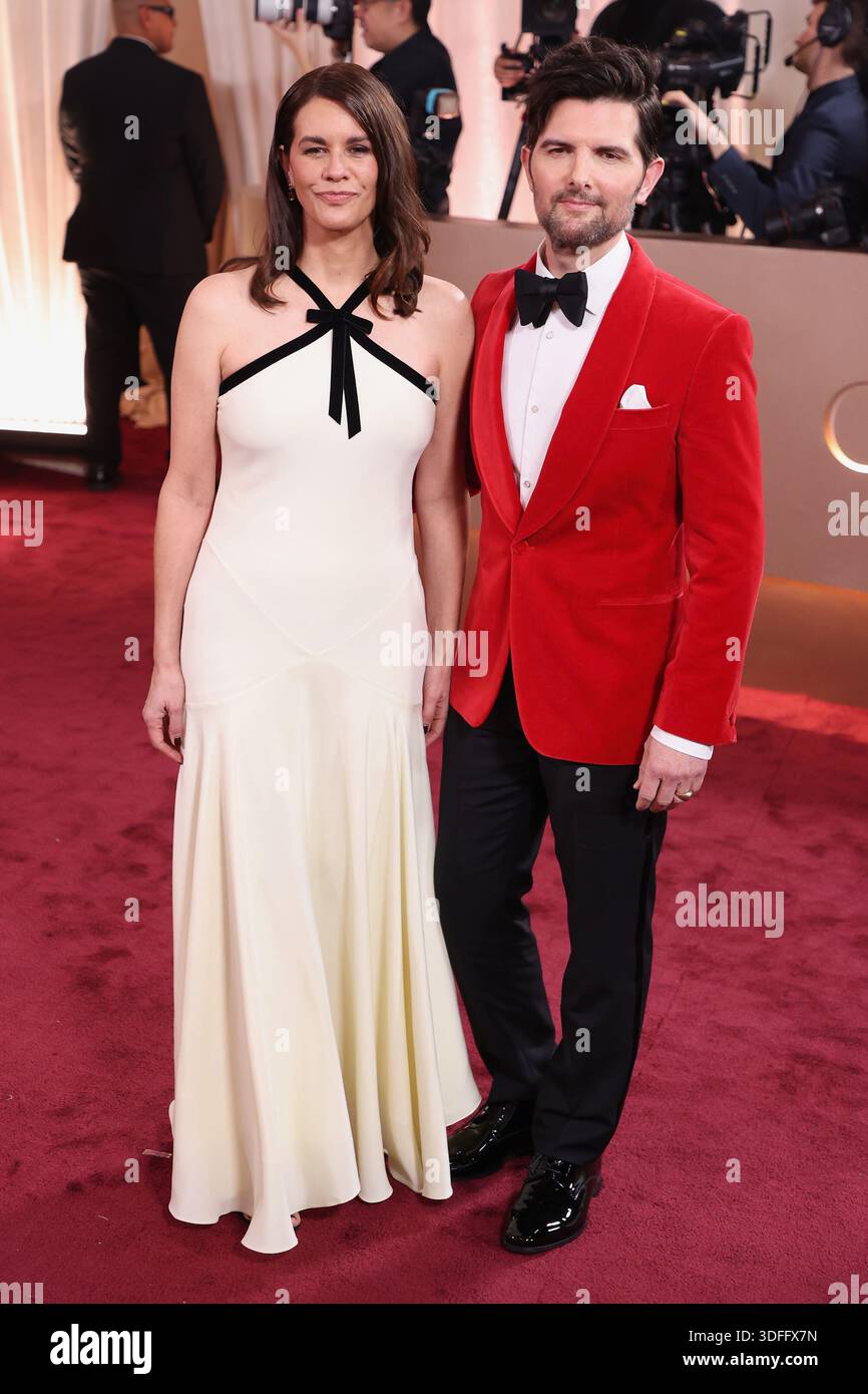 BEVERLY HILLS, CALIFORNIA - JANUARY 11: Adam Scott and Naomi Scott at the 83rd Annual Golden Globe Awards at The Beverly Hilton on January 11, 2026 in Beverly Hills, California. EDITORIAL USAGE ONLY! Not for Commercial USAGE! Stock Photo
