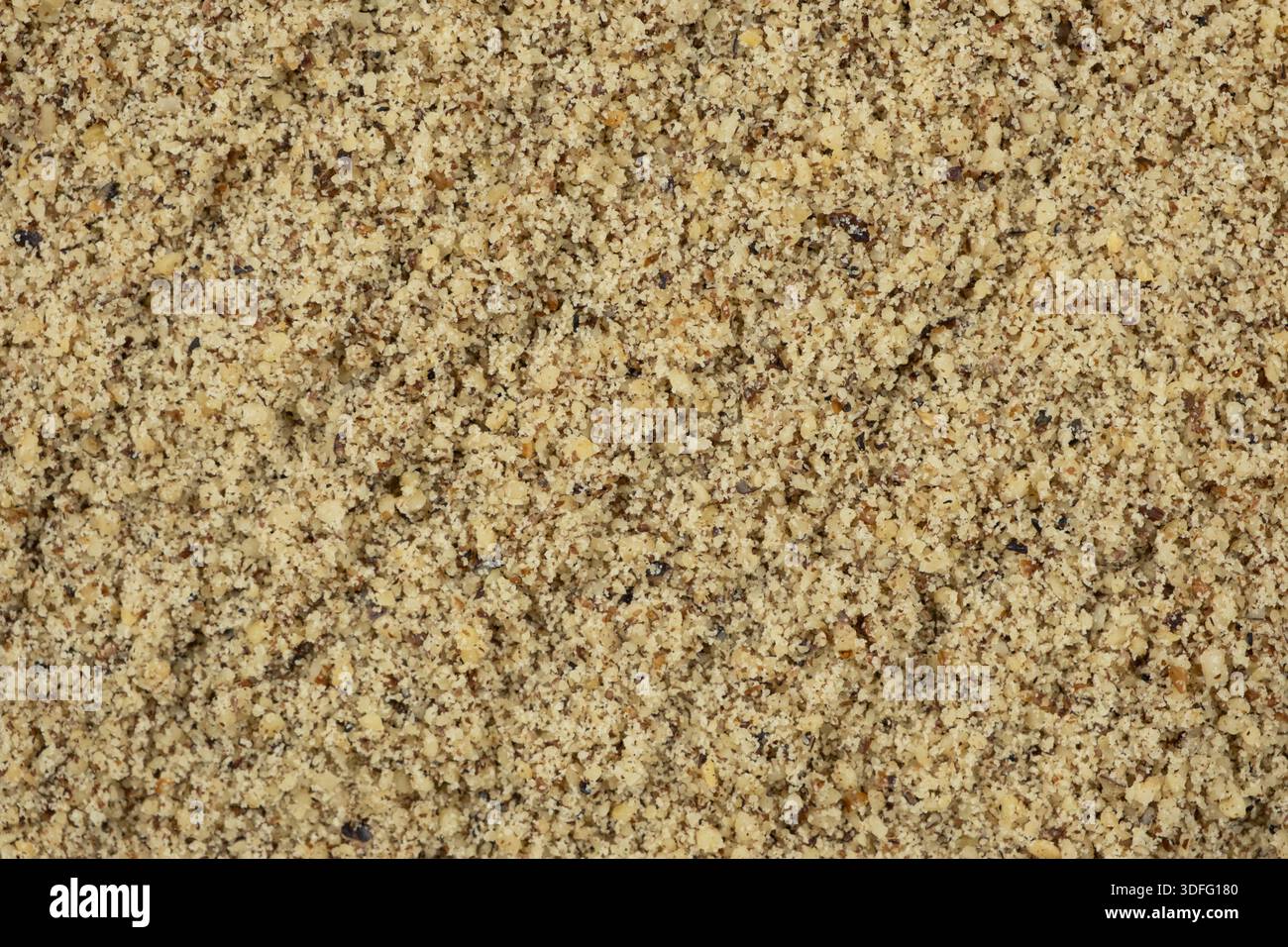 Macro crushed walnut kernels top view. Stock Photo