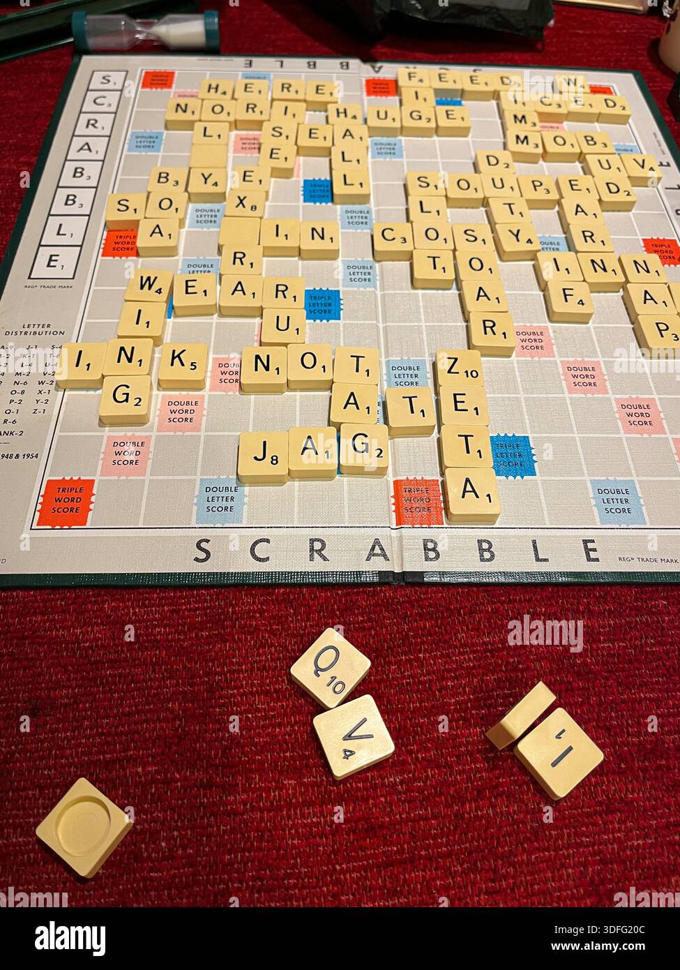 Scrabble board game in progress with letter tiles and strategy concept. English leisure - Smartphone Captured Stock Image