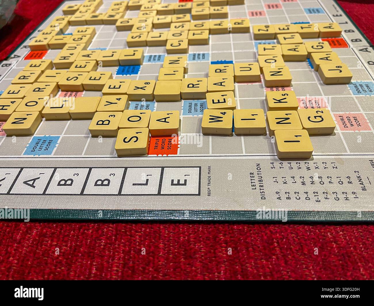 Scrabble board game in progress with letter tiles and strategy concept. English leisure. - Smartphone Captured Stock Image
